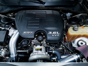 Side view of the RIPP high-performance supercharger components, highlighting precision craftsmanship and durable materials secondary