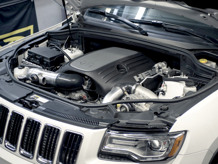 RIPP supercharger system with components displayed, ready for installation and optimized vehicle performance
