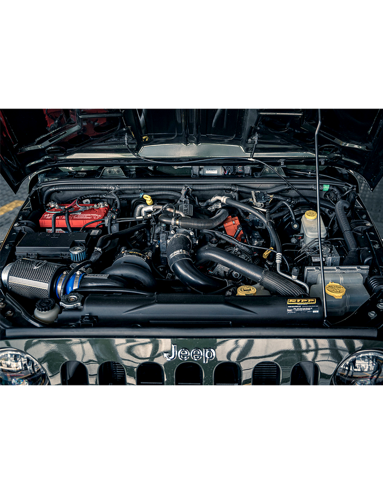 Side view of the Black Ops Edition Supercharger System for 2007-2011 Jeep Wrangler, showcasing advanced engineering