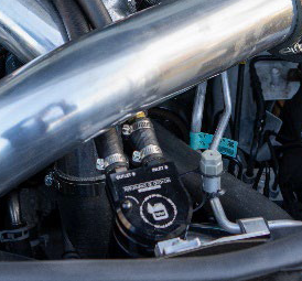 Installed RIPP catch can system in a Jeep Grand Cherokee WK2, showcasing seamless fit and performance enhancement main