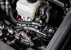 Close-up of a high-performance catch can system, showcasing durable build and advanced design main