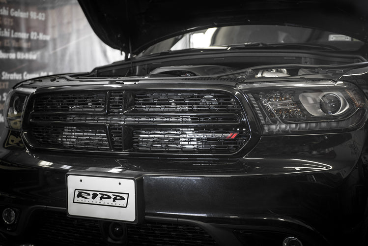 Installed RIPP supercharger system in a vehicle, showcasing improved engine performance and efficient airflow management